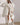 White oversized teddy coat for women, showcasing an elegant winter overcoat style.