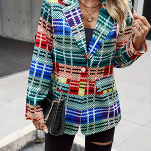 A woman wearing a colorful checkered blazer with a fashionable tartan pattern, white accents, and long sleeves.