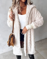 Blush pink teddy coat for women made from faux fur, showcasing a cozy and stylish winter outerwear design with long sleeves and a soft texture.
