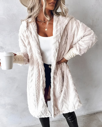 Blush pink teddy coat for women, featuring faux fur material, long sleeves, and a stylish collar design, perfect for winter fashion.