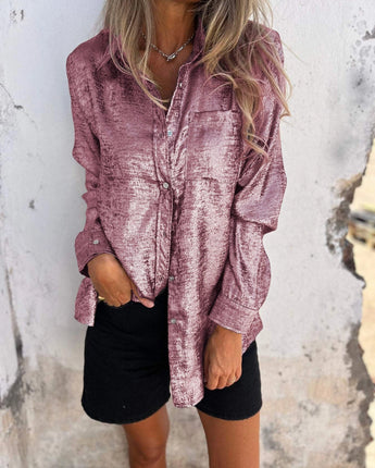 
Alt Text: A stylish metallic silver blazer for women, designed as a fashion party jacket. The blazer features a subtle rose tint and is available in size 5XL. It has a sleek appearance with long sleeves and tailored fit, suitable for fashionable outerwear or as a statement piece.