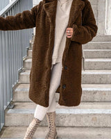 Brown long teddy coat for women in XXL, featuring a fashionable winterwear design with a cozy and textured outer appearance.