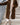 Brown long teddy coat for women in XXL, featuring a fashionable winterwear design with a cozy and textured outer appearance.