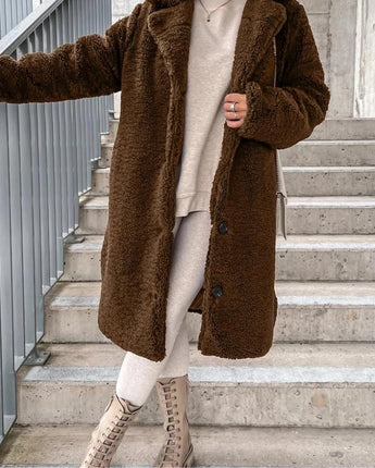 Brown long teddy coat for women in XXL, featuring a fashionable winterwear design with a cozy and textured outer appearance.