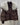 Brown designer women's winter jacket with fur collar, featuring a grey down material, long sleeves, and a parka style, showcasing a fashionable design.