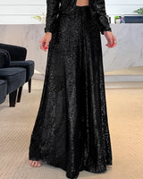 Goldene, weit geschnittene Pailletten-Hose in Schwarz, Größe 5XL, präsentiert auf einem hellen Untergrund, geeignet für elegante Abendveranstaltungen.