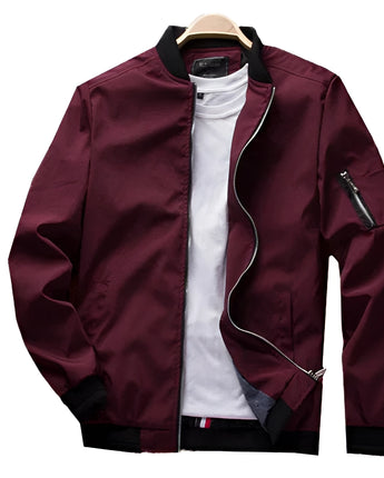 Men's Bordeaux Bomber Jacket in 4XL, featuring a stylish urban design with a sleek outerwear silhouette, long sleeves, and a defined collar. The jacket has a lightweight feel and a purple hue that adds a modern touch.