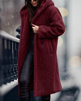 Long blue teddy coat for women, designed for winter fashion, shown in a red wine color and XL size, highlighting details such as the overcoat style, full sleeves, and cozy material.