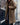 
A long, khaki teddy coat for women in size XL, featuring a plush texture ideal for winter fashion. The coat has a classic overcoat design with a collar, full-length sleeves, and a waist-length fit, providing warmth and style.