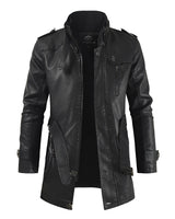 A man wearing a black leather trenchcoat with military and biker style elements, featuring long sleeves, a collar, and multiple pockets, suitable for winter and gothic fashion.