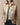 Navy Damen Designer Steppjacke doppelreihig tailliert in Khaki, Größe 5XL, mit elegantem Kragen und langen Ärmeln, modisch geschnitten und für stilvolle Outfits geeignet.