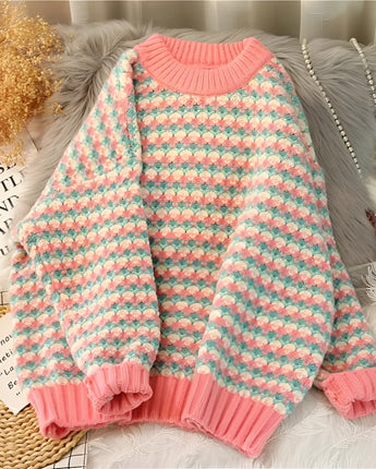Rosa Pastell Strickpullover für Damen in Größe 3XL, mit Hahnentrittmuster in Pink, Grün und Blau, auf einem Kleiderbügel präsentiert.