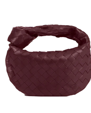 Black braided leather hobo bag, designer luxury handbag with a stylish, textured design and a spacious interior.