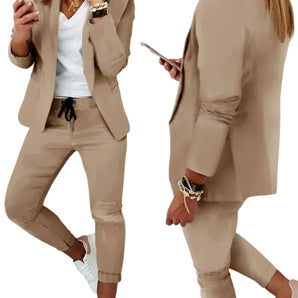 Woman wearing a trendy khaki casual blazer and black jogger suit, suitable for lightweight workwear, in XL size.
