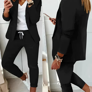 Women's Casual Blazer Black Jogger Suit - Trendy Lightweight Workwear in black, size XL, featuring a blazer and jogger pants set, displayed on a model with a white dress shirt, showcasing the outfit's fit and style.
